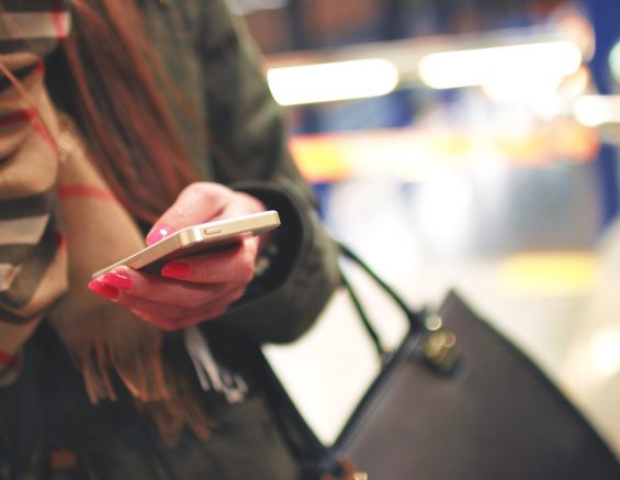 Woman Holding Smartphone