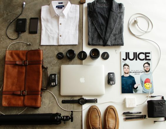 Laptop surrounded by Personal Items