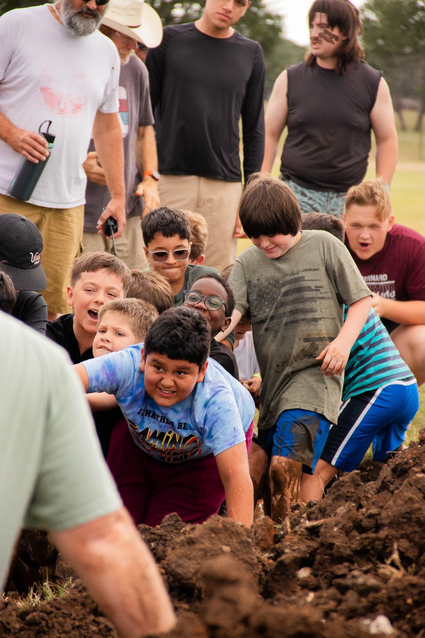 Campers cheering during a field game